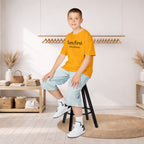 Kids Tee — "Born First. Still in Charge." Sibling Shirt