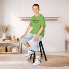 Kids Tee — "Born First. Still in Charge." Sibling Shirt