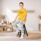 Kids Tee — "Born First. Still in Charge." Sibling Shirt