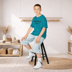 Kids Tee — "Born First. Still in Charge." Sibling Shirt